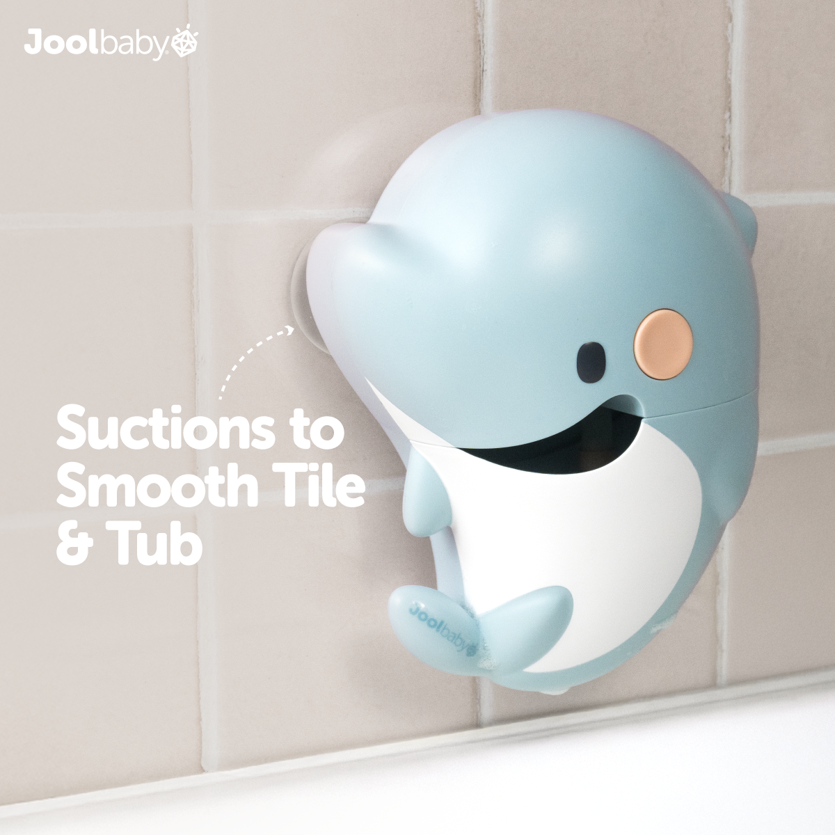 Dolphin bath toy suctions to smooth tub and tile