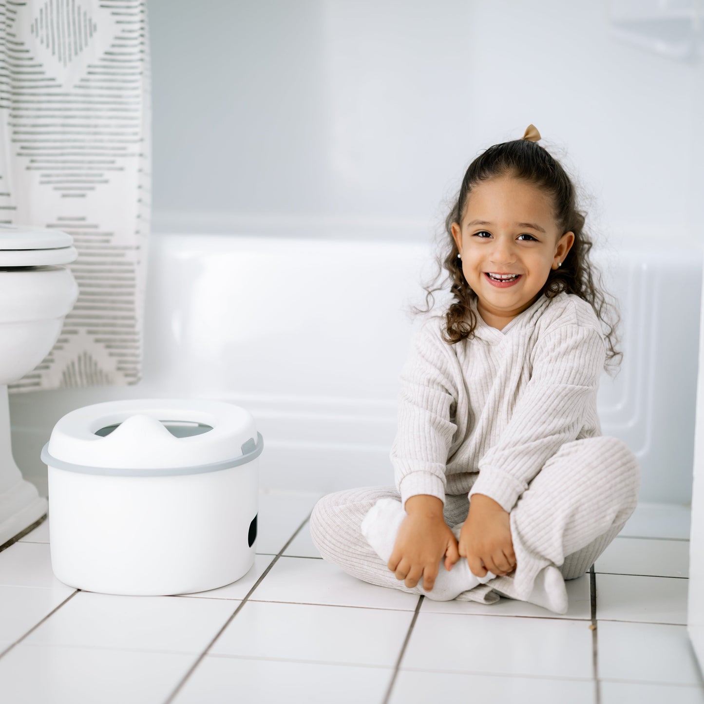 Toddler girl potty training with potty seat