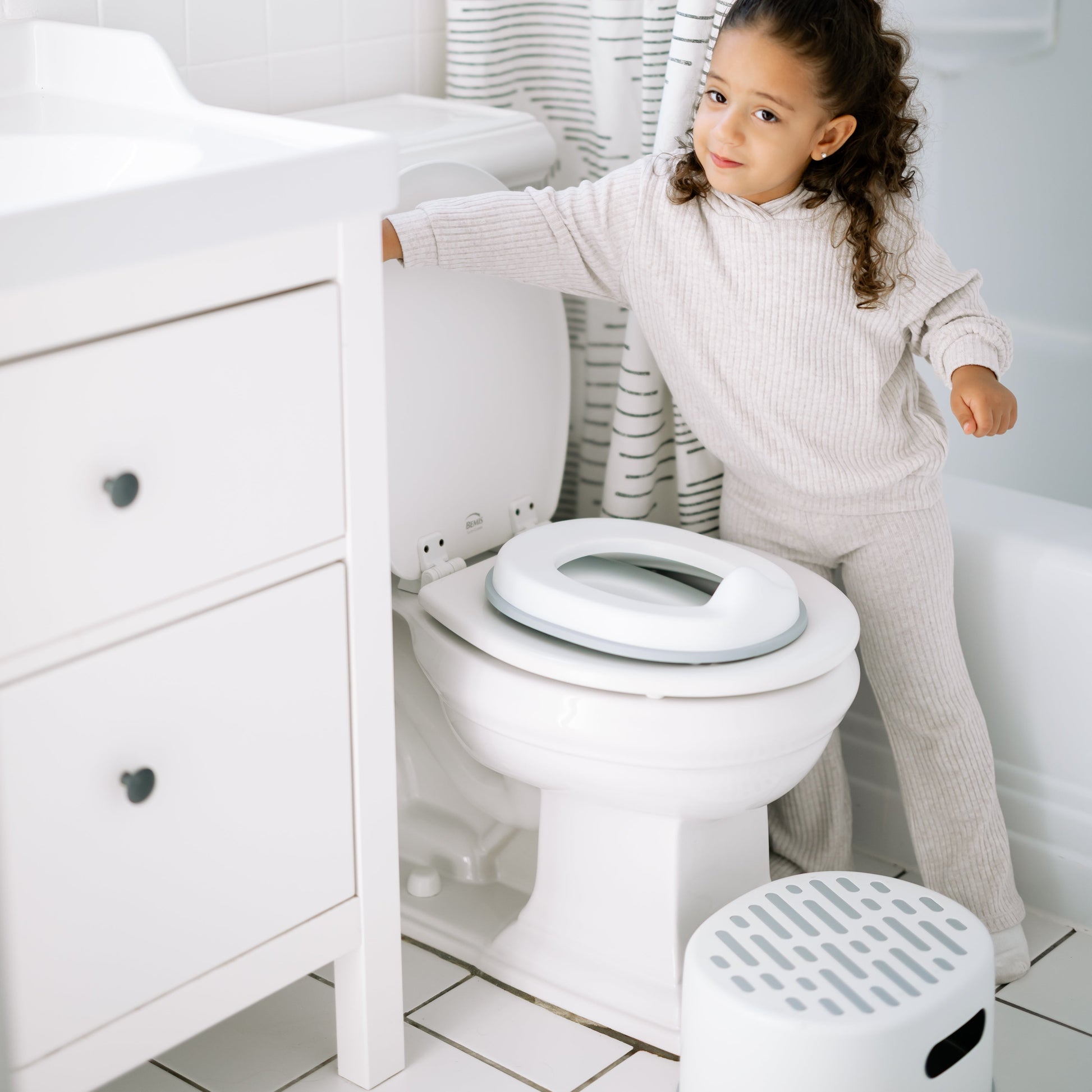Toddler girl learning to potty train
