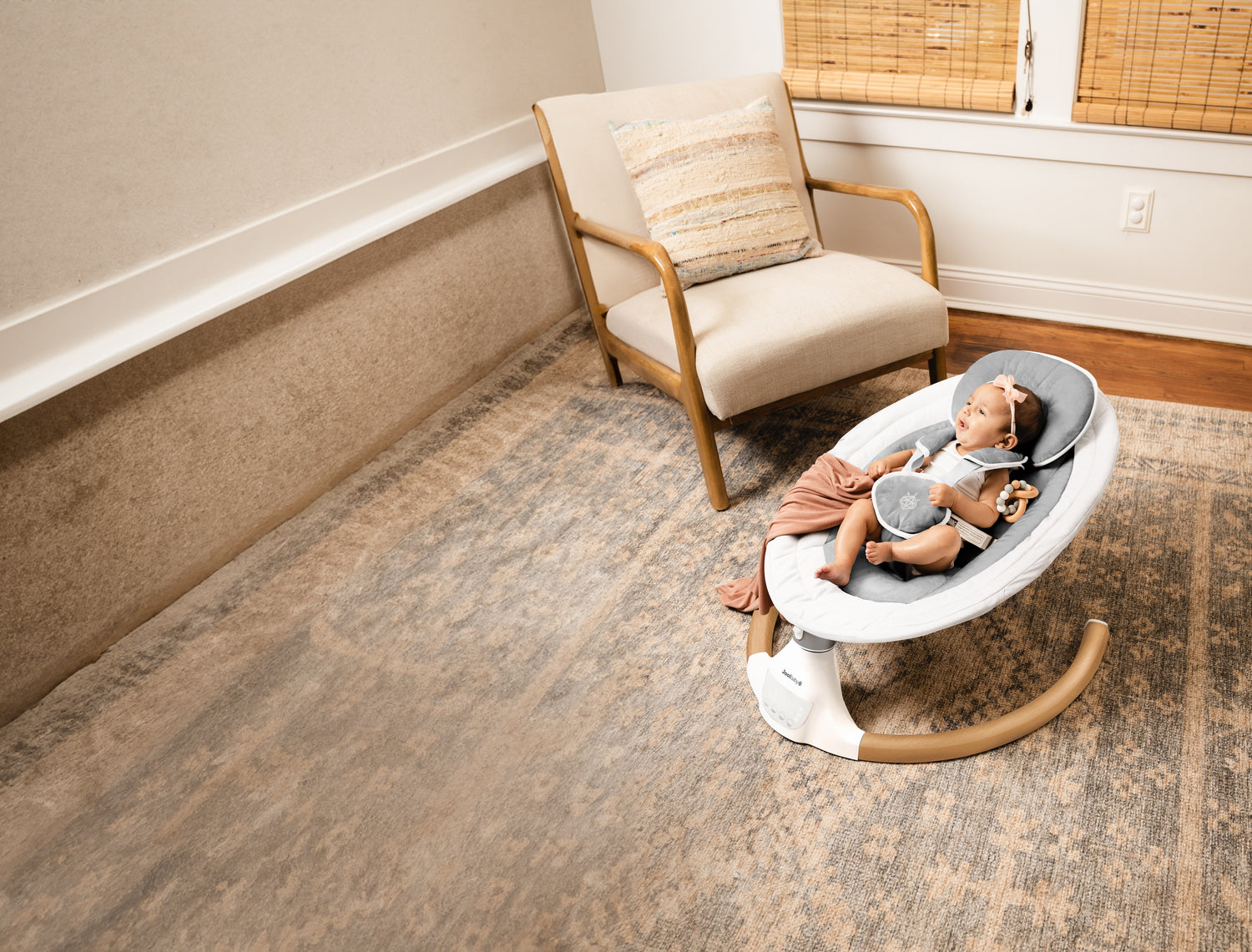 Baby being entertained in nova nature baby swing