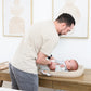 Baby getting diaper change on Jool Baby Waterproof changing pad