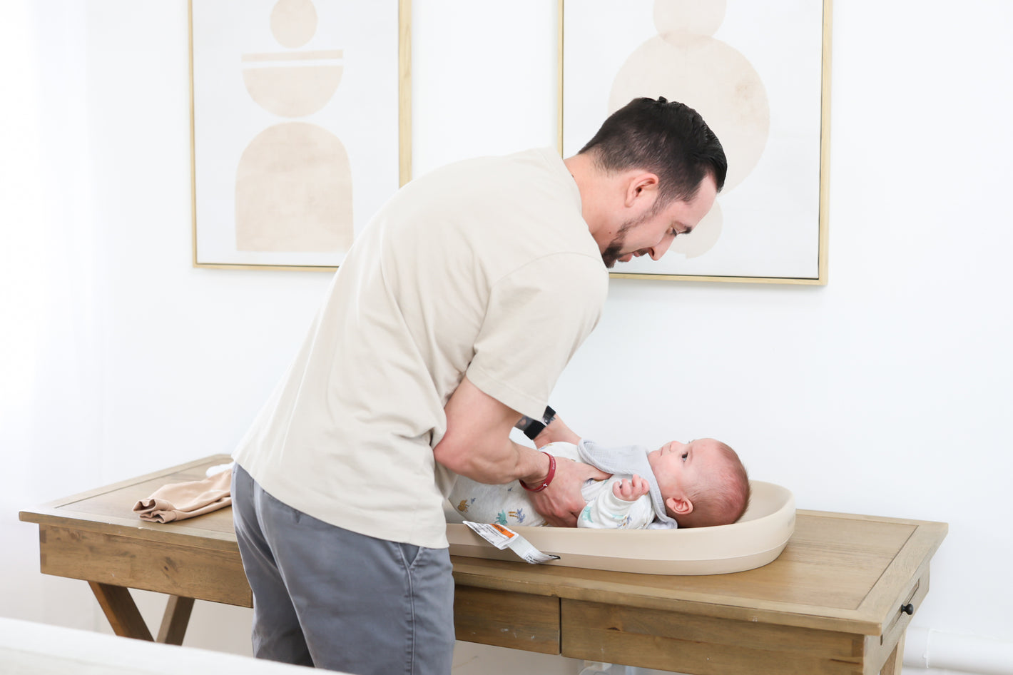 Baby getting diaper change on Jool Baby Waterproof changing pad