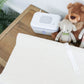 Wipe warmer and changing pad with wave cover